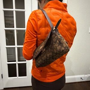 Orange Jacket with Brown Patterned Shoulder Bag